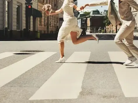 Attorney reviewing pedestrian fatality case files in Surprise office with desert landscape view