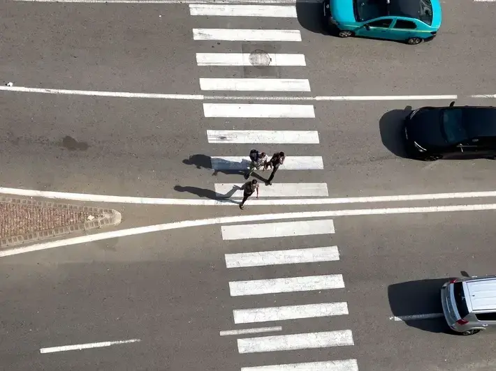 Avondale pedestrian wrongful death lawyer reviewing fatal crash evidence near Historic Downtown Avondale crosswalk