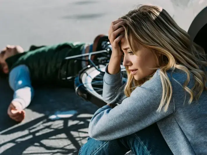 Lawyer consulting with family near Surprise Stadium about drunk driver wrongful death claim