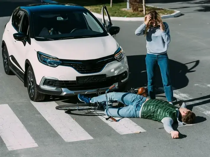 Legal team analyzing traffic camera footage for pedestrian death claim on Lake Pleasant Parkway in Peoria